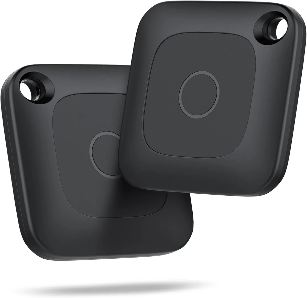 Two black Homing Tag item trackers, front and back